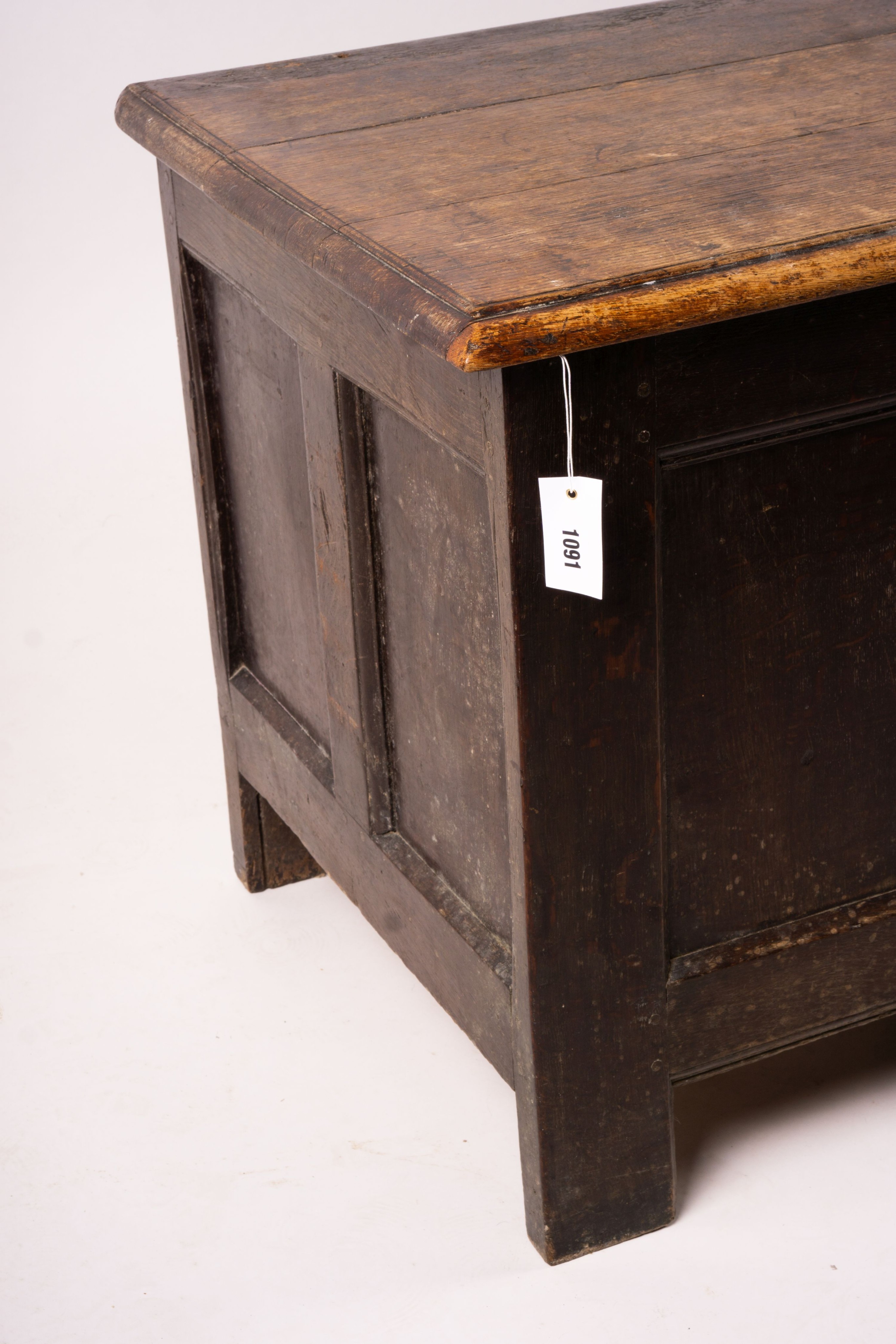 A 17th century panelled oak coffer, length 136cm, depth 56cm, height 64cm